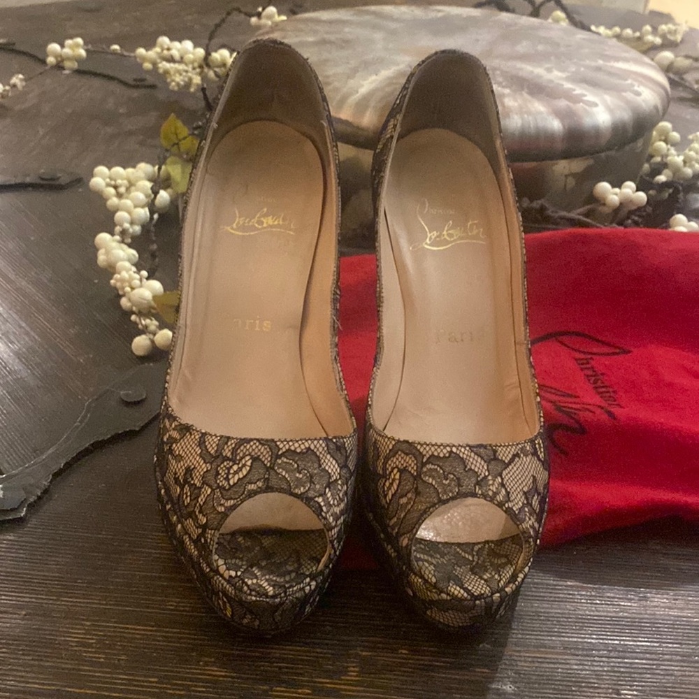 Christian Louboutin used very prive peep toe platform pumps